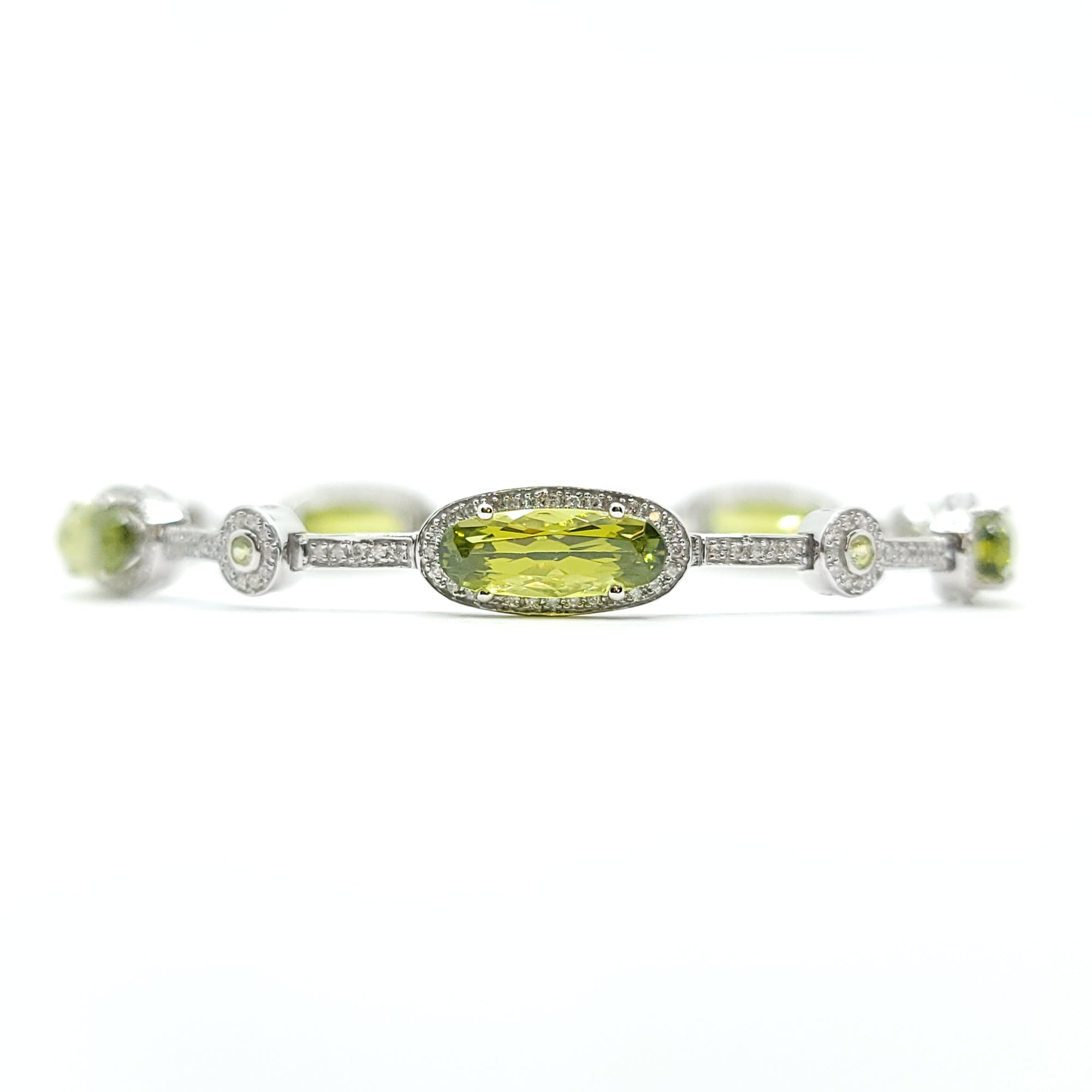 14K WHITE GOLD PERIDOT AND DIAMOND LADIES TENNIS BRACELET