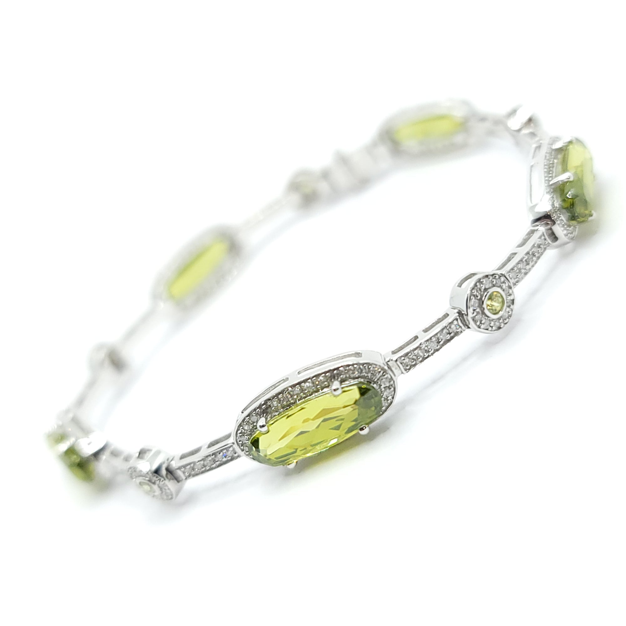 14K WHITE GOLD PERIDOT AND DIAMOND LADIES TENNIS BRACELET