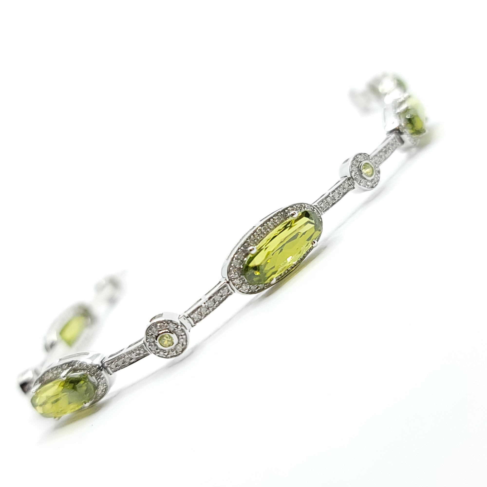 14K WHITE GOLD PERIDOT AND DIAMOND LADIES TENNIS BRACELET