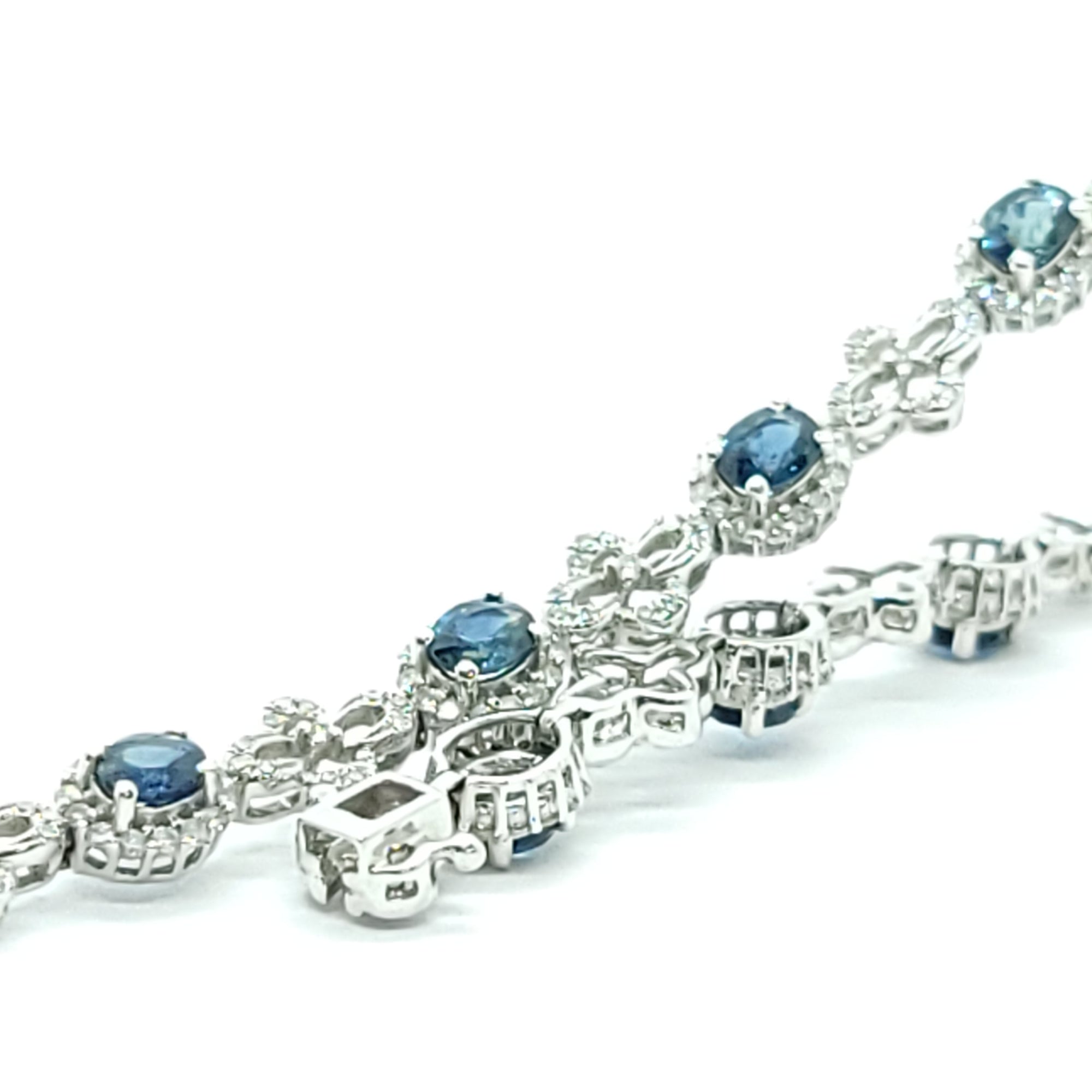 MODERN DIAMOND OVAL CUT TEAL  SAPPHIRE TENNIS BRACELET 18K WHITE GOLD LADIES