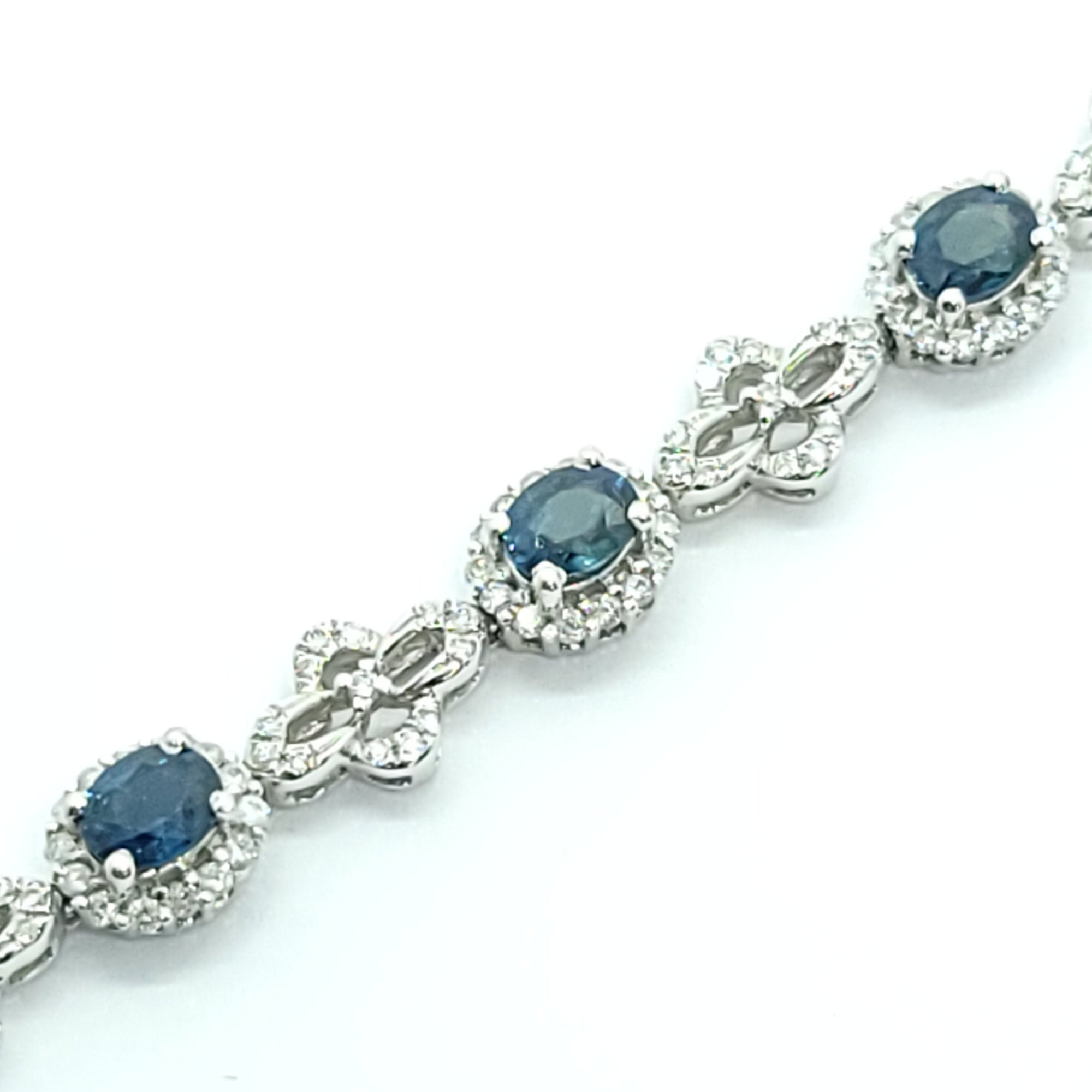 MODERN DIAMOND OVAL CUT TEAL  SAPPHIRE TENNIS BRACELET 18K WHITE GOLD LADIES