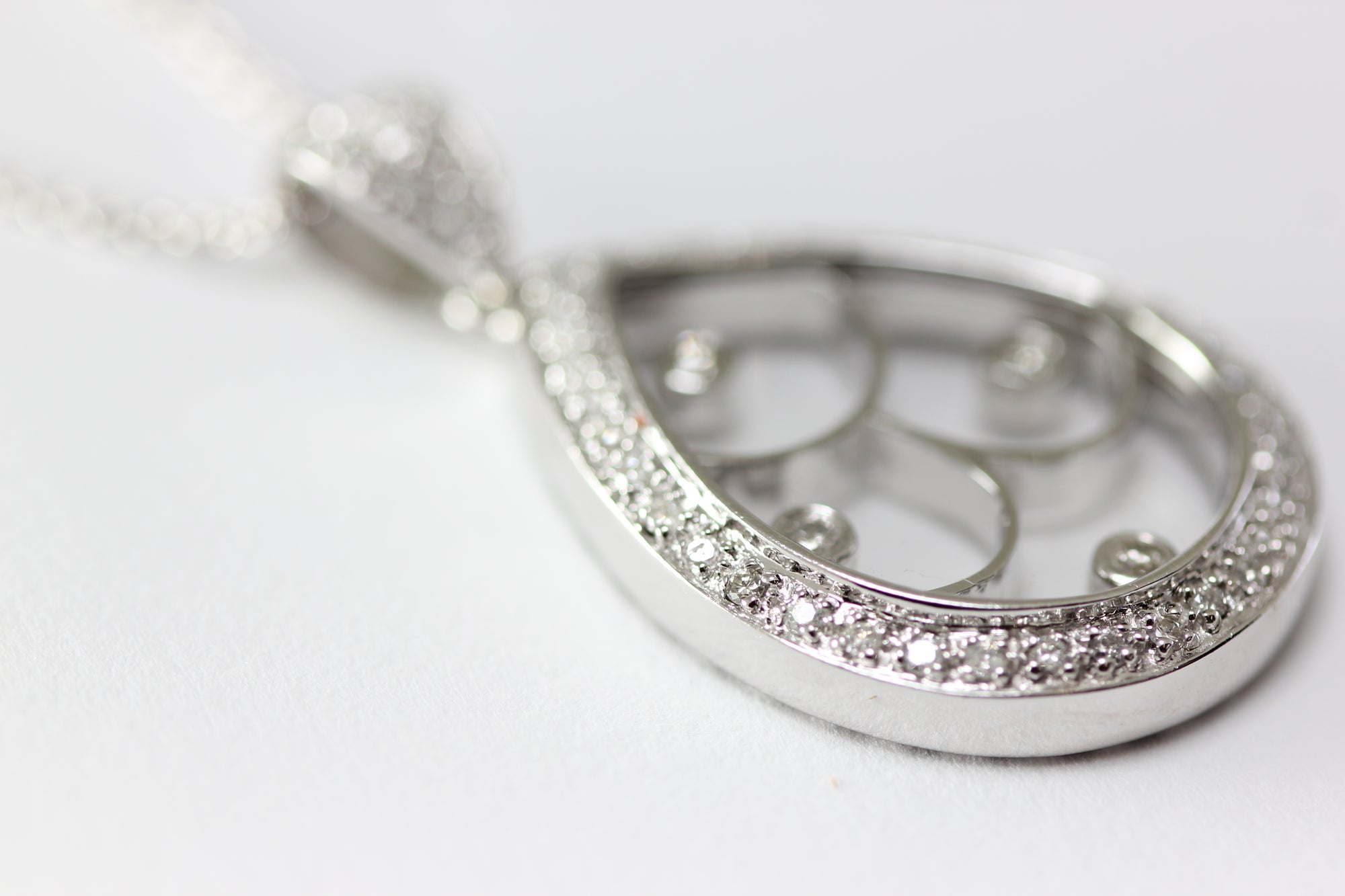 MODERN LADIES PEAR SHAPE HAPPY DIAMONDS  PENDANT AND CHAIN 14k WHITE GOLD