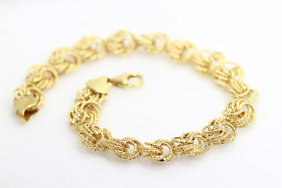ABC 14K YELLOW GOLD LADIES DIAMOND CUT TWIST FLOWER  LINK BRACELET