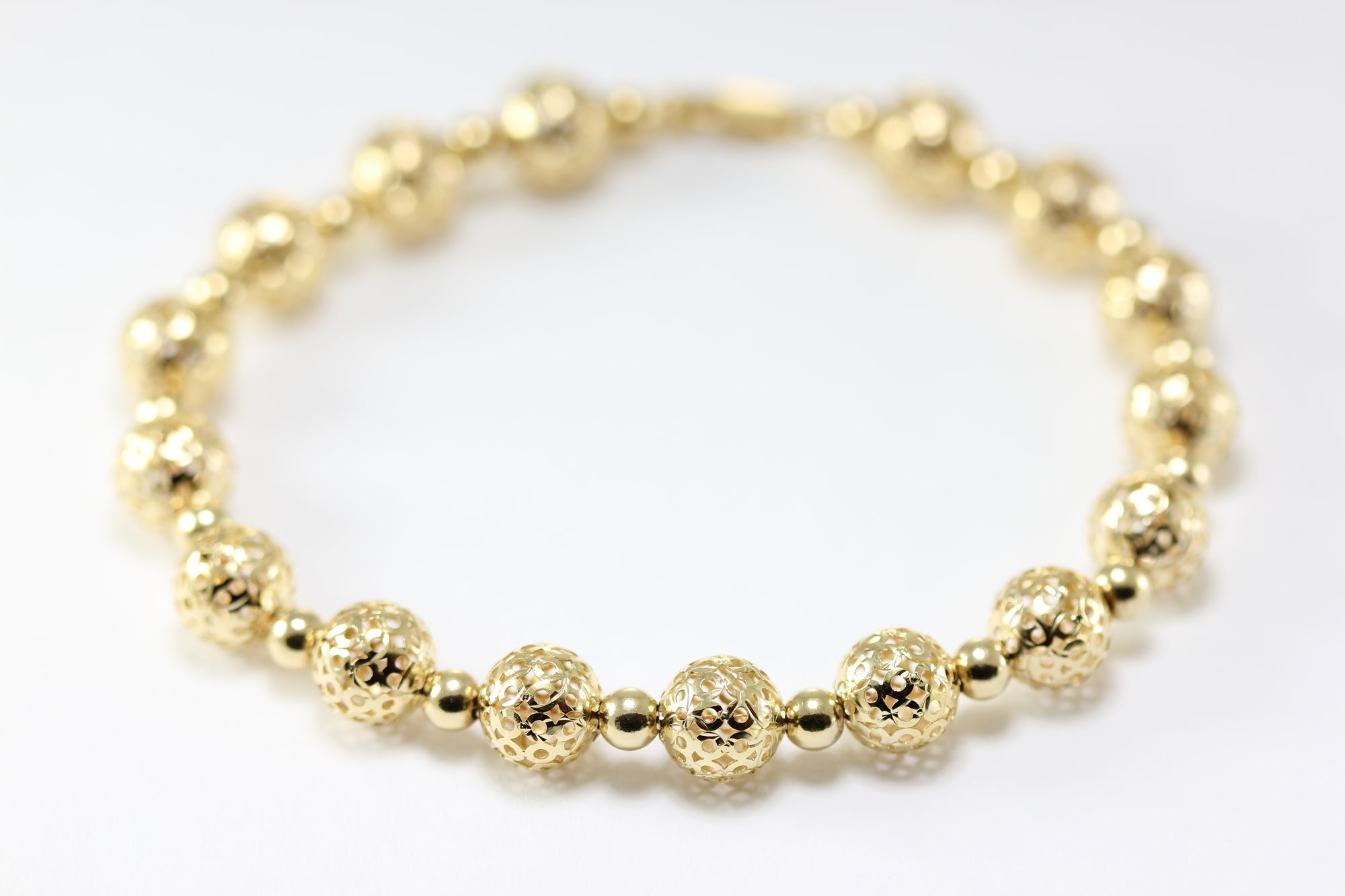 14K YELLOW GOLD FANCY BEADS BRACELET