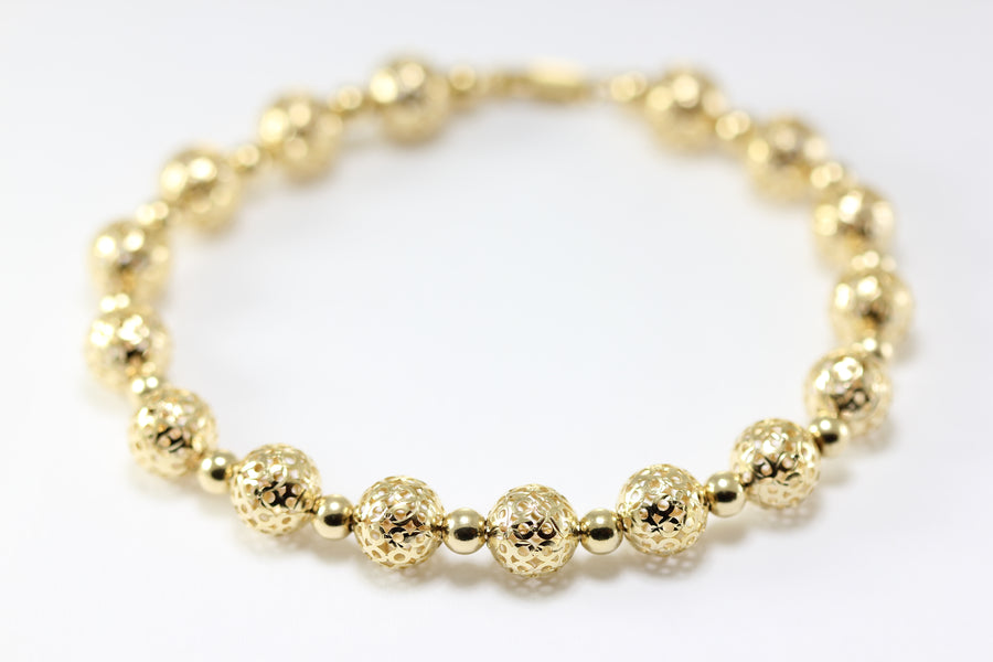 14K YELLOW GOLD FANCY BEADS BRACELET