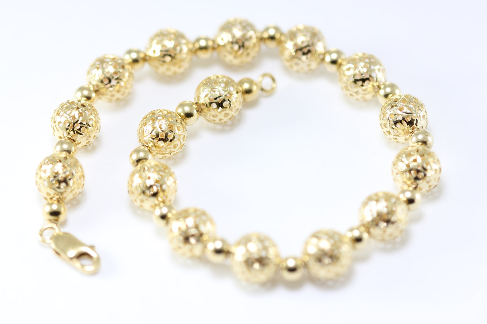 14K YELLOW GOLD FANCY BEADS BRACELET