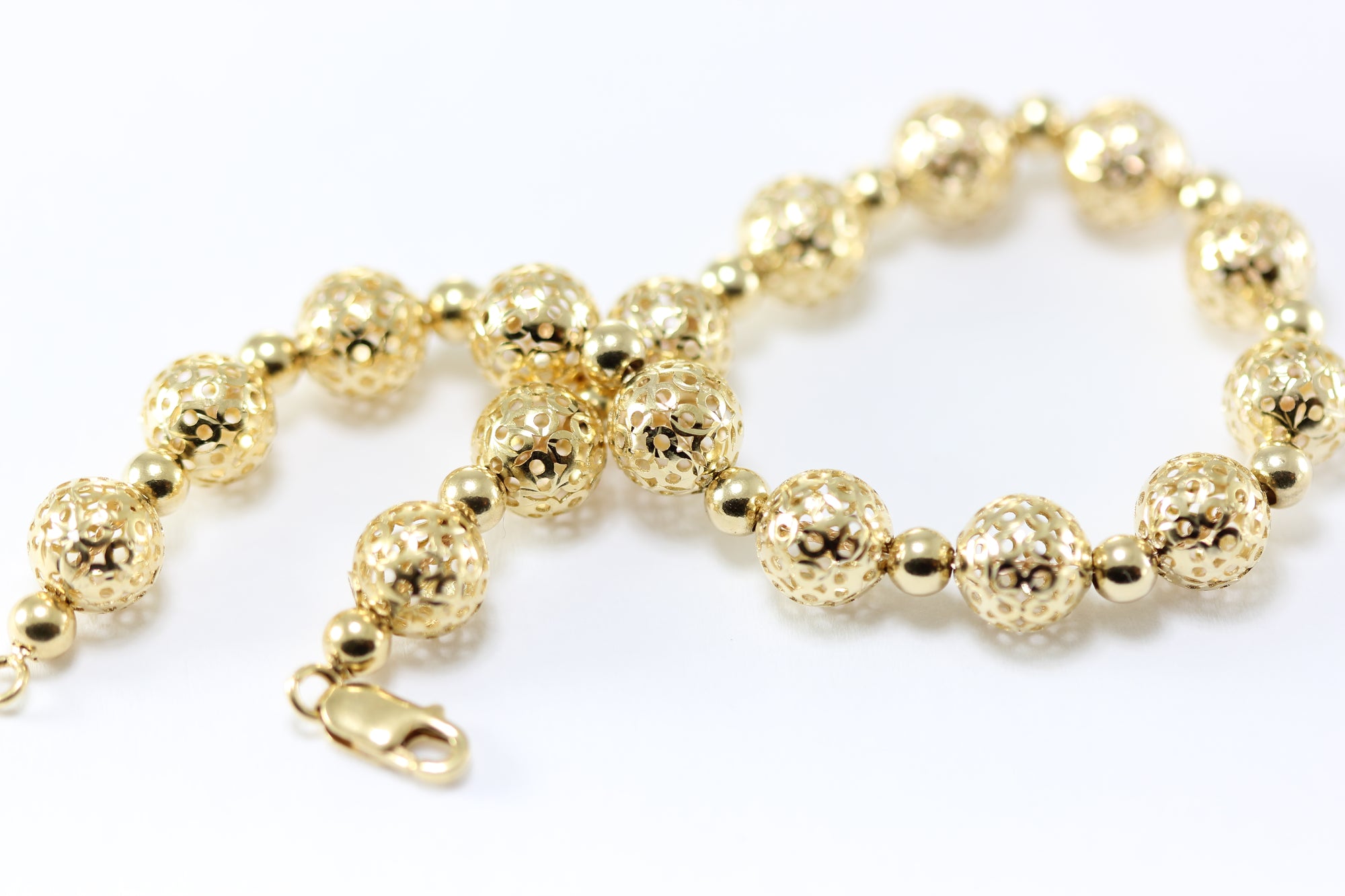 14K YELLOW GOLD FANCY BEADS BRACELET