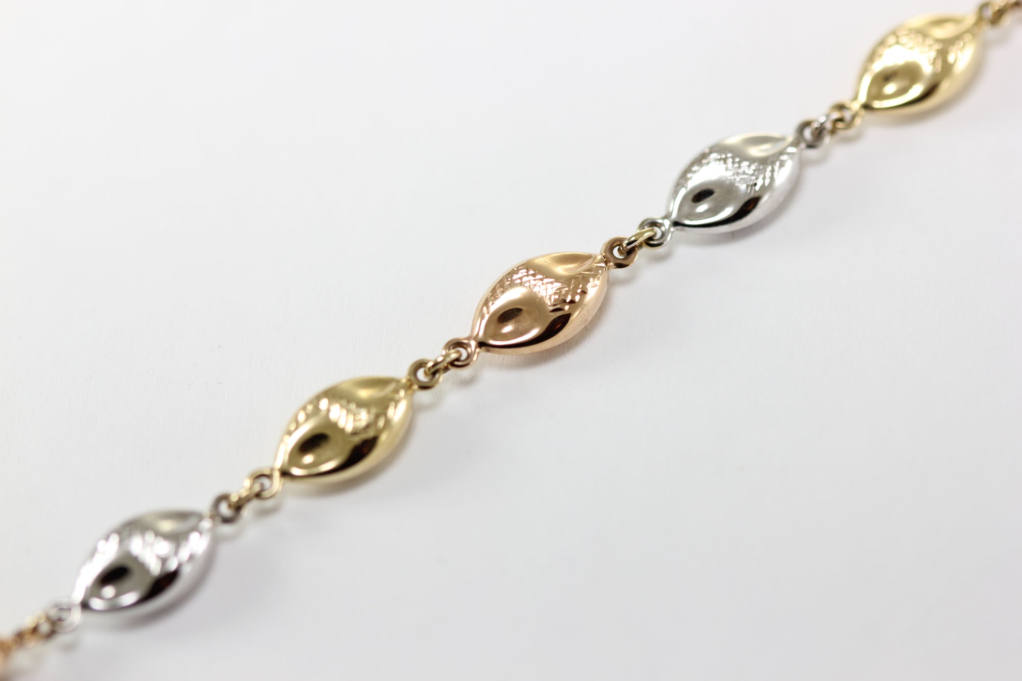 14K TRI COLOR GOLD BRUSHED LINK BRACELET