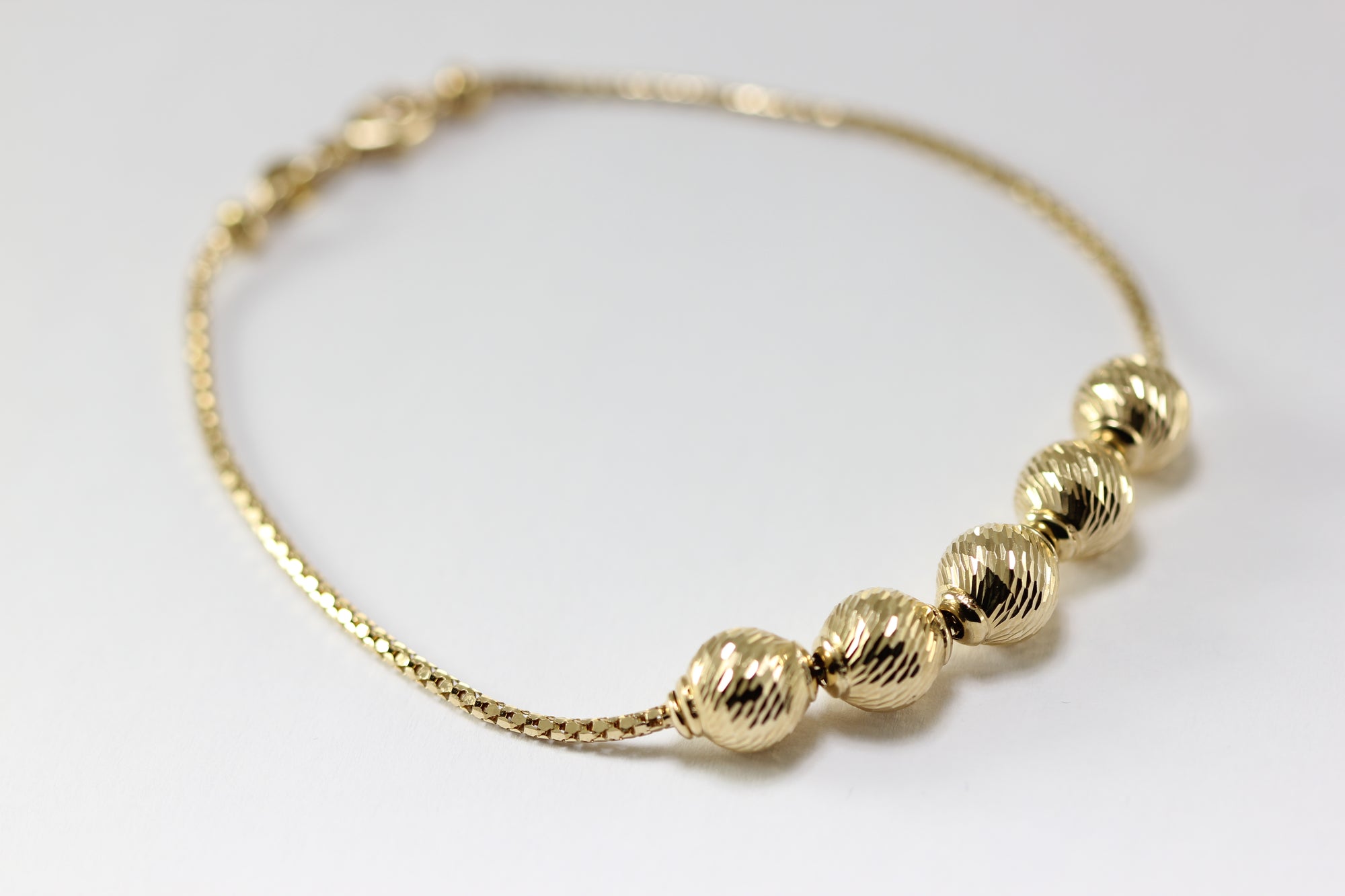 14K YELLOW GOLD DIAMOND CUT BEADS  BRACELET