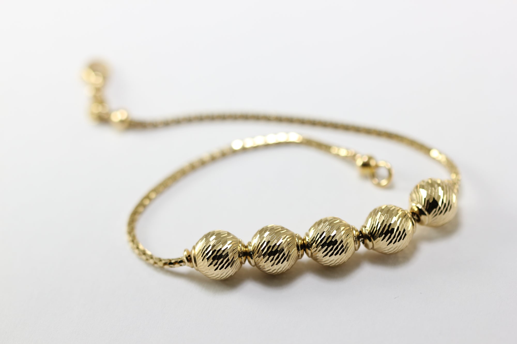 14K YELLOW GOLD DIAMOND CUT BEADS  BRACELET