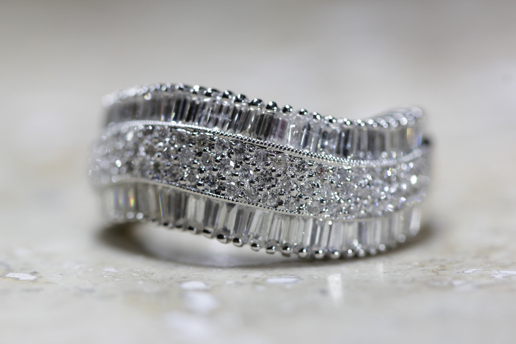 LADIES SWIRL DIAMOND WEDDING BAND ROUND AND BAGUETTES 14K W GOLD