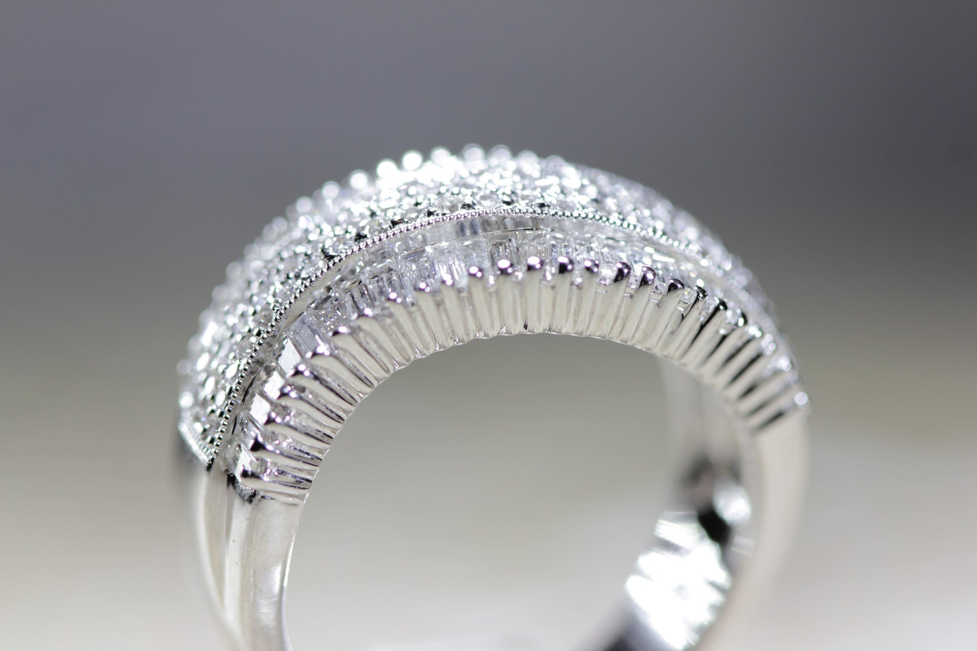 LADIES SWIRL DIAMOND WEDDING BAND ROUND AND BAGUETTES 14K W GOLD