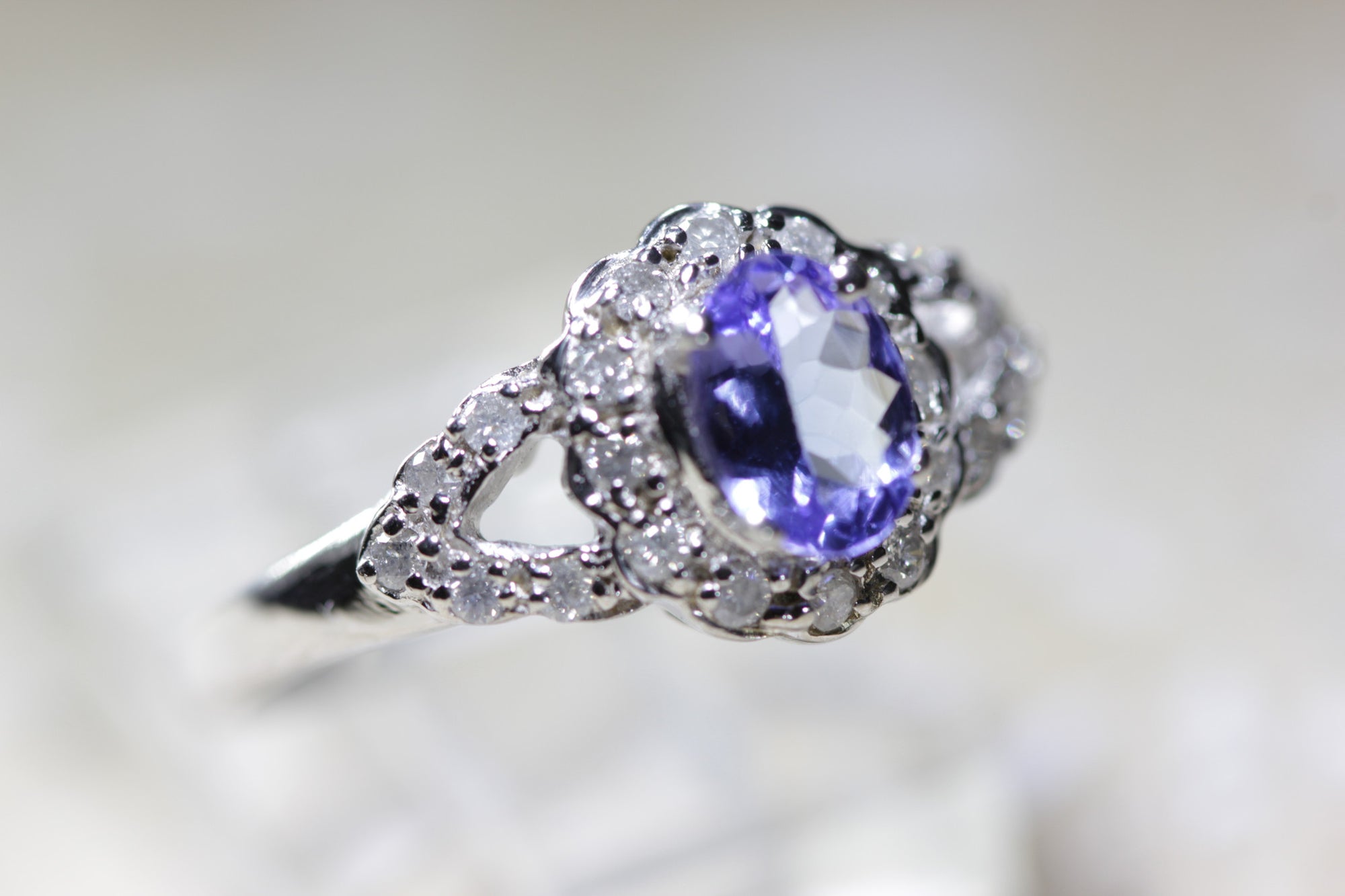 HALO OVAL SHAPE 14K WHITE GOLD LADIES TANZANITE & DIAMOND RING