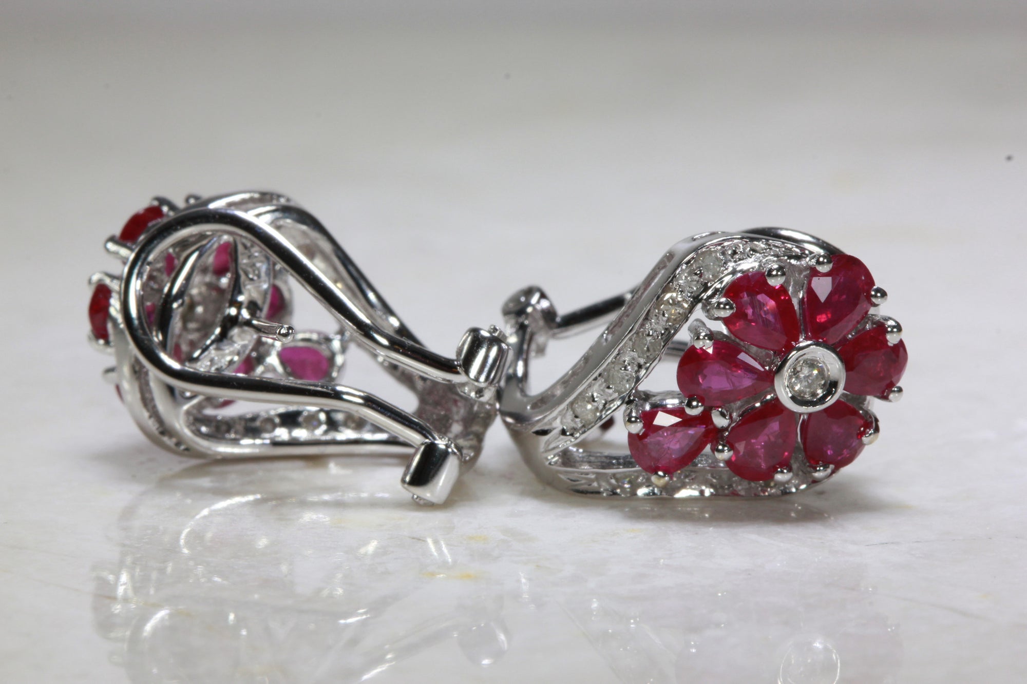 RUBY & DIAMOND FLOWER EARRINGS IN 14k WHITE GOLD SETTING