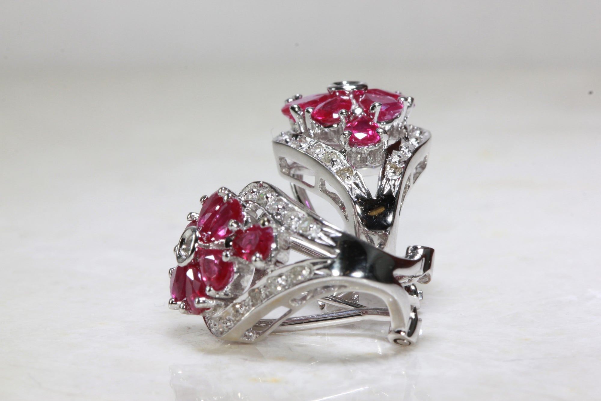 RUBY & DIAMOND FLOWER EARRINGS IN 14k WHITE GOLD SETTING