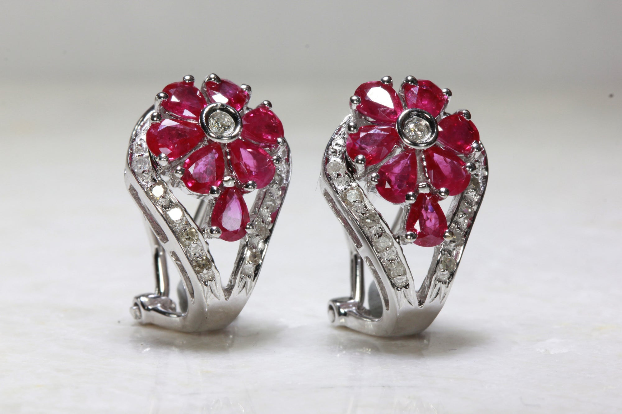 RUBY & DIAMOND FLOWER EARRINGS IN 14k WHITE GOLD SETTING