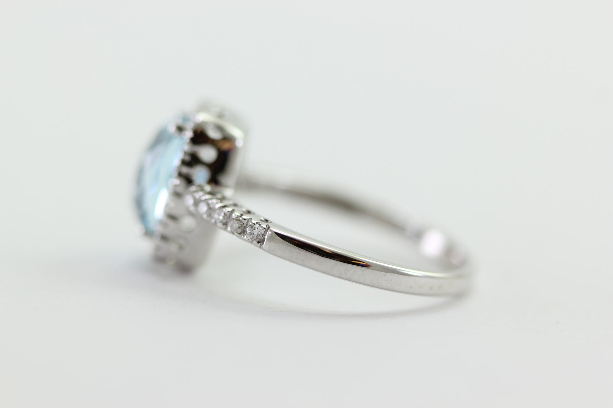 CHECKERBOARD SWISS BLUE TOPAZ DIAMOND HALO SET IN 14k WHITE GOLD RING