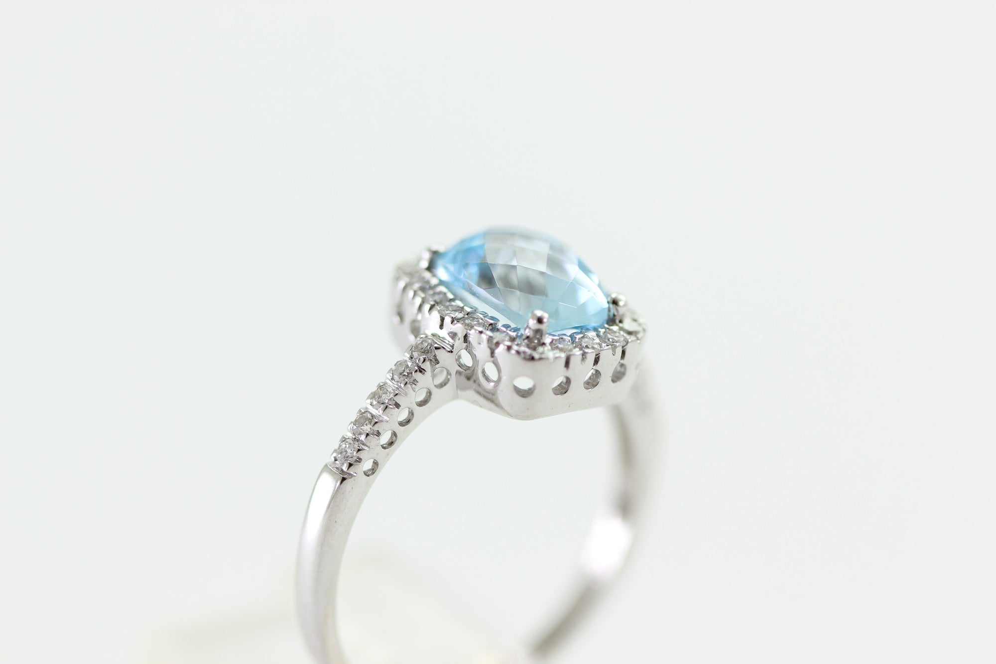 CHECKERBOARD SWISS BLUE TOPAZ DIAMOND HALO SET IN 14k WHITE GOLD RING