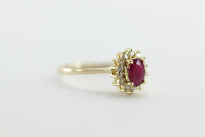 RUBY & DIAMOND HALO SET IN 14k YELLOW GOLD RING