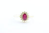 RUBY & DIAMOND HALO SET IN 14k YELLOW GOLD RING