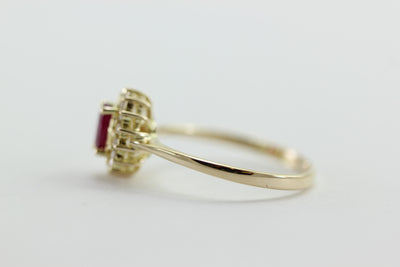 RUBY & DIAMOND HALO SET IN 14k YELLOW GOLD RING